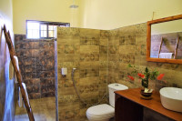 Ensuite bathroom with hot water rain showers