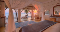 Rubondo Island Camp - Double room with view of sunset over lake