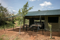  Each tent has a private outside seating area with deck chairs overlooking the savannah