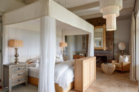 Sumptuous bedroom suite at Singita Serengeti House 