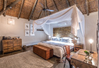 Four spacious and intimate chalets are nested in the valley providing panoramic views over the bush. 
