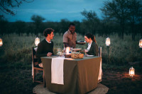 The Romance of a Private starlit bush dinner in the Serengeti is hard to beat