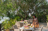 The dining deck overlooking the Zambezi at Waterberry