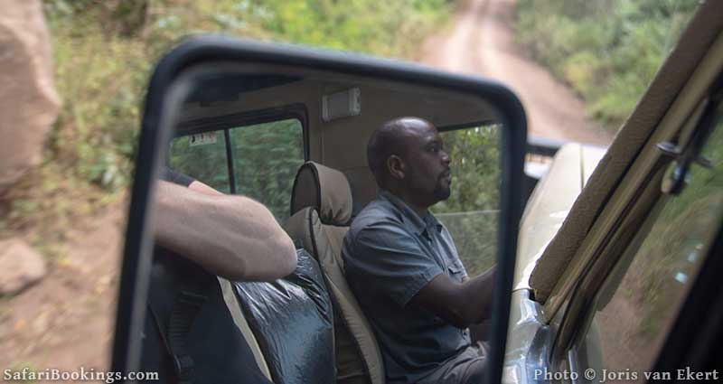 African Safari guide keeping his eyes on the road