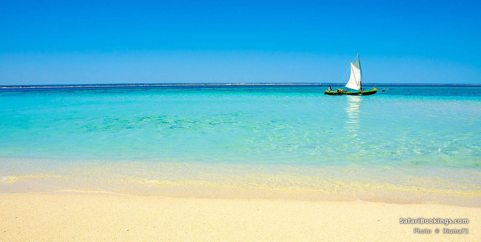Beach scene with fishing boat at Anakao in Madagascar