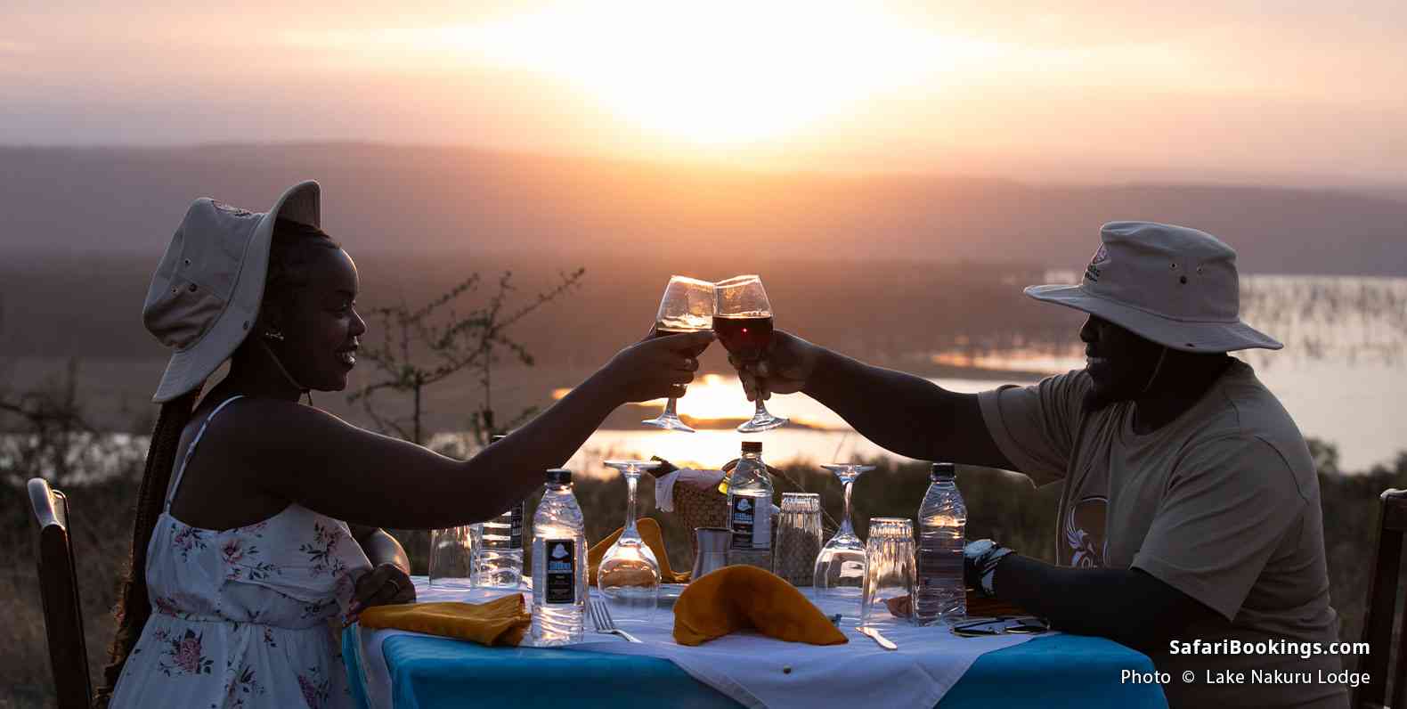 Couple having a sunset dinner at the Lake Nakuru Lodge