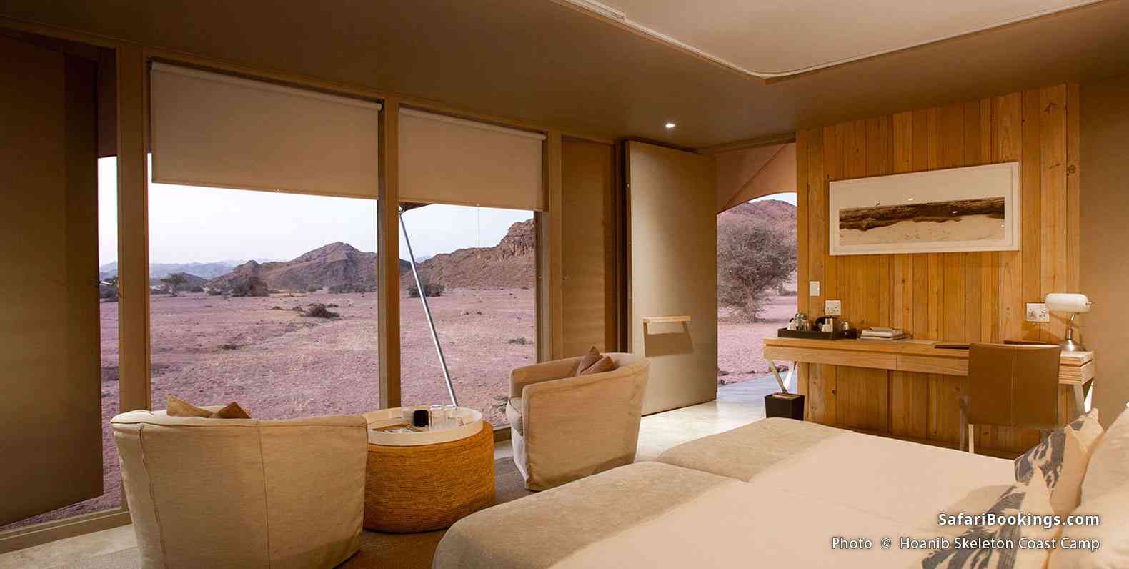 Tent interior and stunning desert landscape views at Hoanib Skeleton Coast Camp