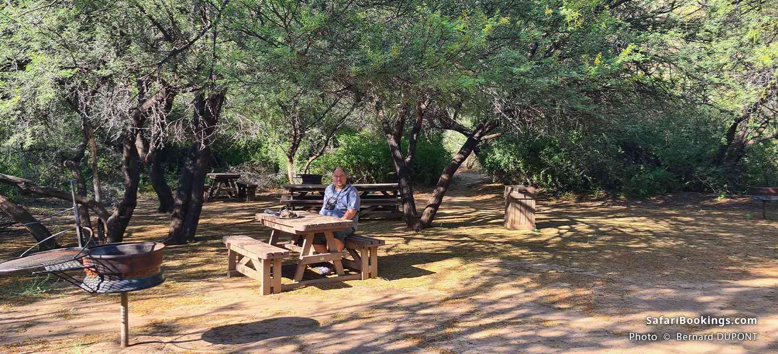 Tourist resting at the Doornhoek Picnic Site, Karoo National Park