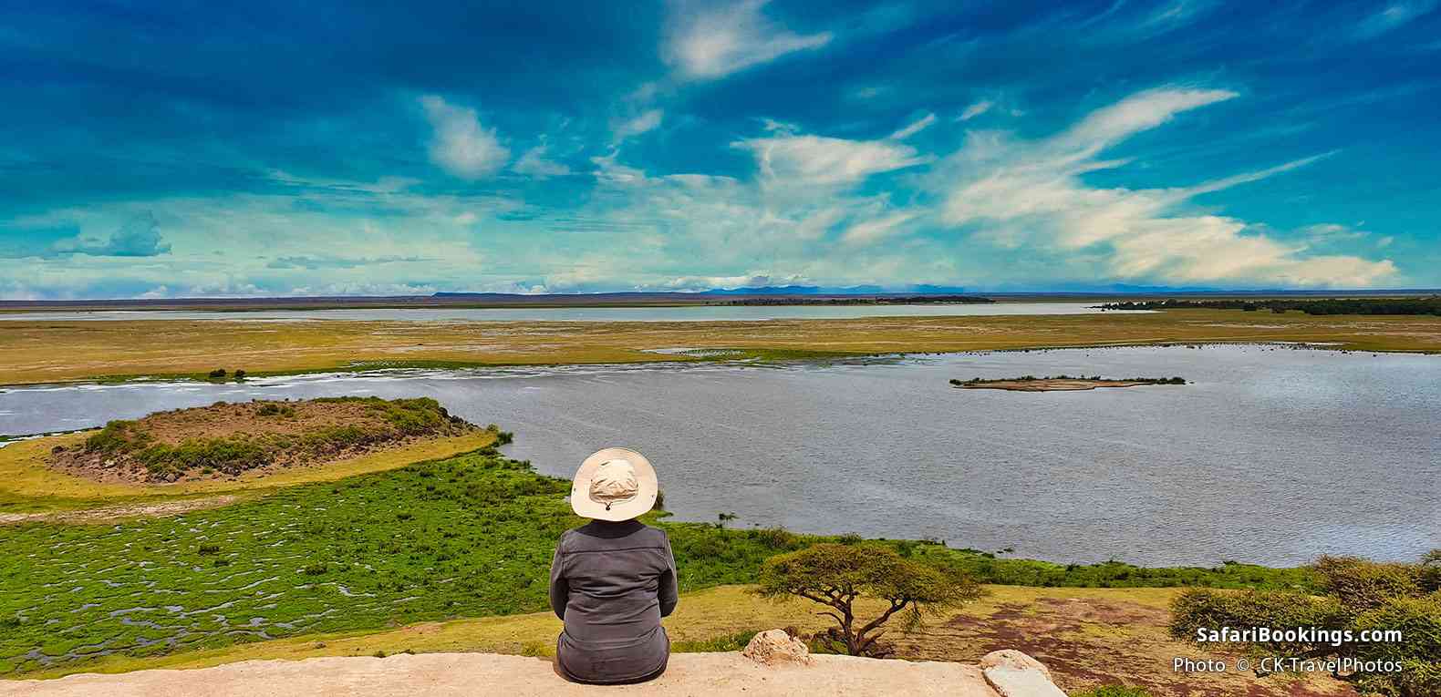 Traveler overlooks Amboseli from the top of the Observation Hill