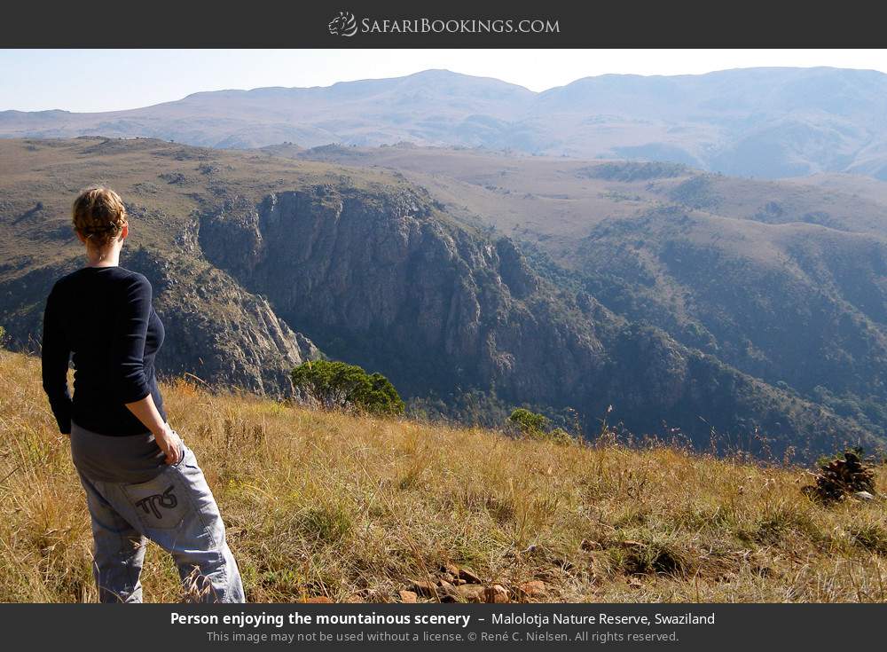 Person enjoying the mountainous scenery in Malolotja Nature Reserve, Eswatini