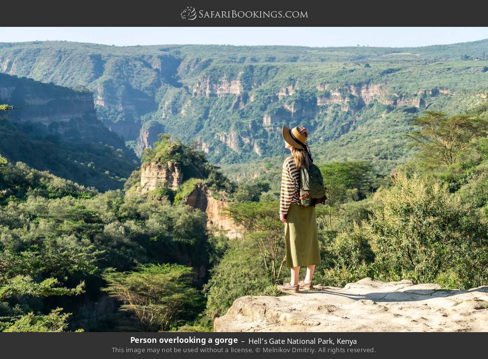 Person overlooking a gorge in Hell’s Gate National Park, Kenya