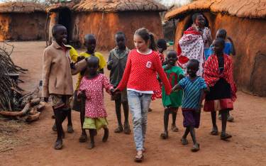 Girl visiting a Maasai village