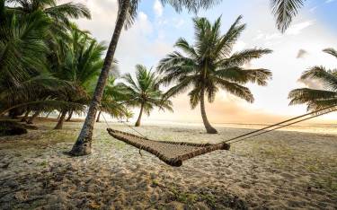 Hammock between palms on Diani Beach