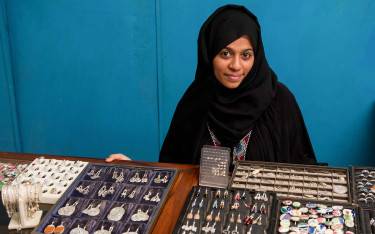 Swahili women selling silver jewelry