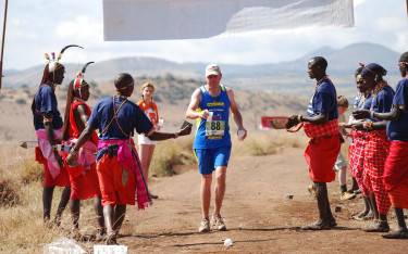 Maasai handing out water for the runners