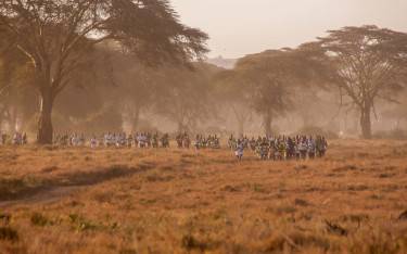 Marathon runners crossing the conservancy