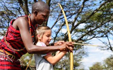 Learning to shoot a bow and arrow
