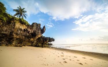 Idyllic beach with rocky outcrops