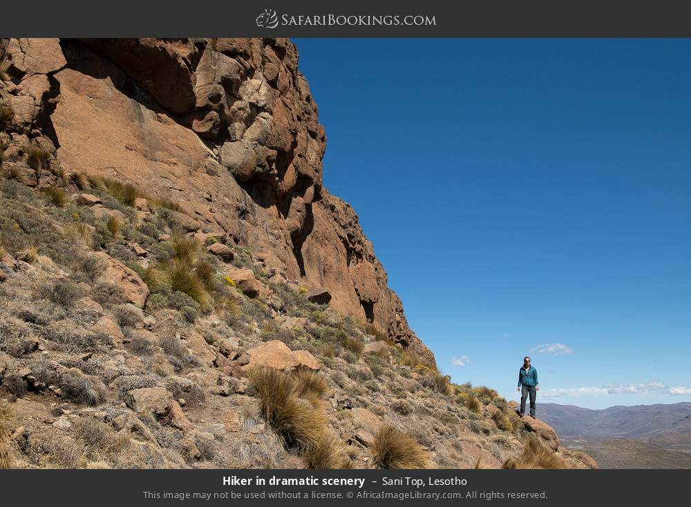 Hiker in dramatic scenery in Sani Top, Lesotho