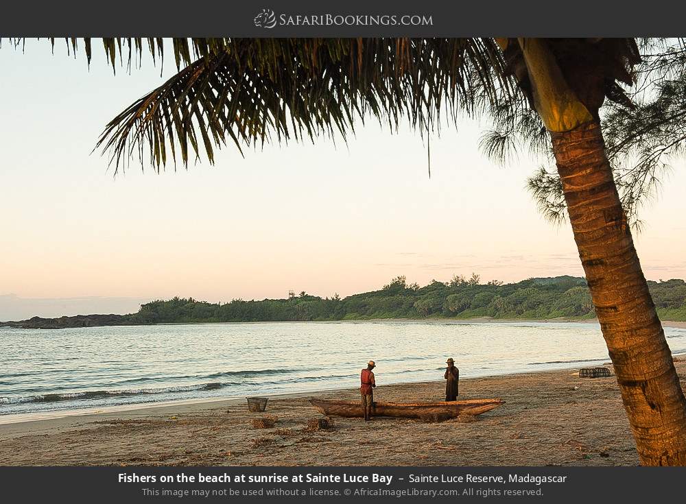 Fishers on the beach at sunrise at Sainte Luce Bay in Sainte Luce Reserve, Madagascar