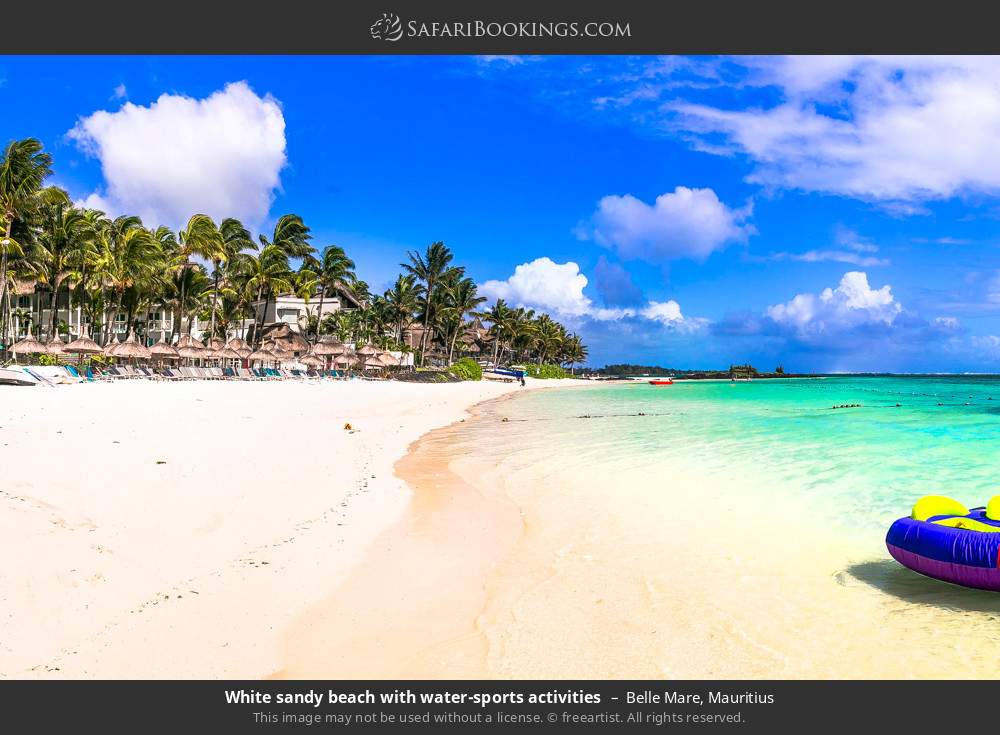 White sandy beach with water-sports activities in Belle Mare, Mauritius