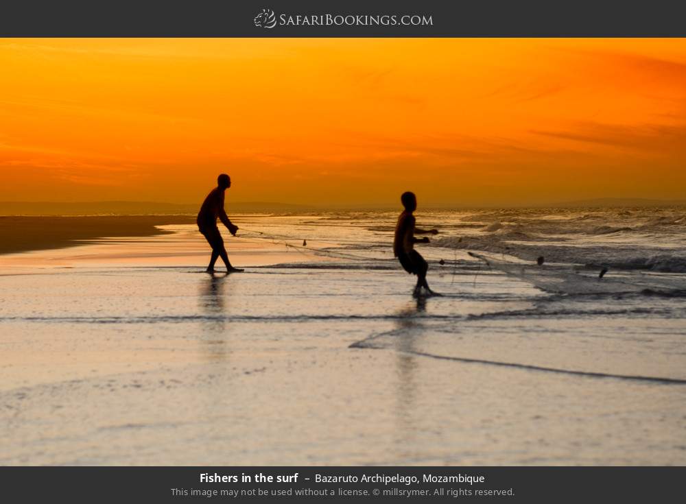 Fishers in the surf in Bazaruto Archipelago, Mozambique