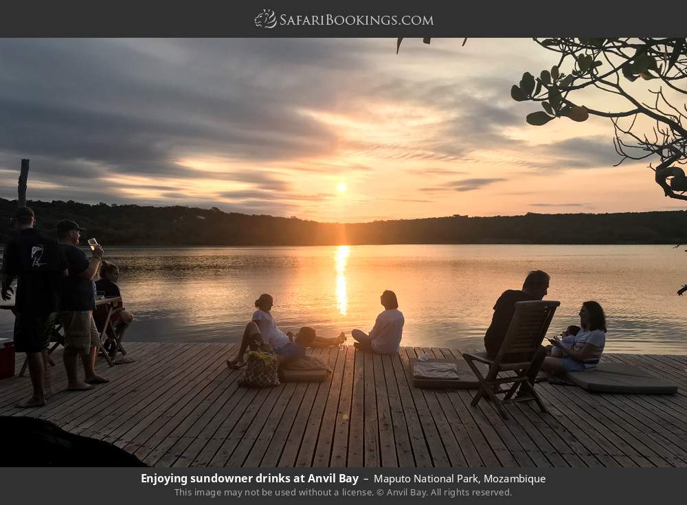 Tourists enjoying sundowner drinks at Anvil Bay in Maputo Special Reserve, Mozambique