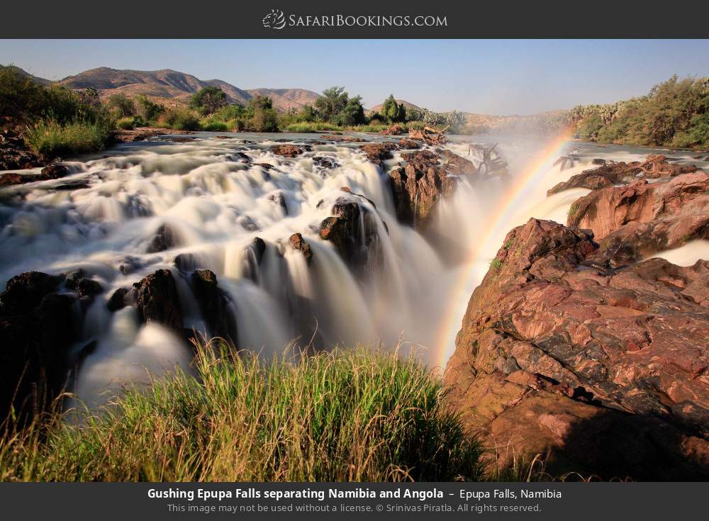 Gushing Epupa Falls separating Namibia and Angola in Epupa Falls, Namibia