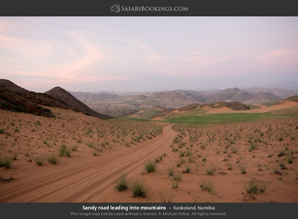 Sandy road leading into mountains in Kaokoland, Namibia