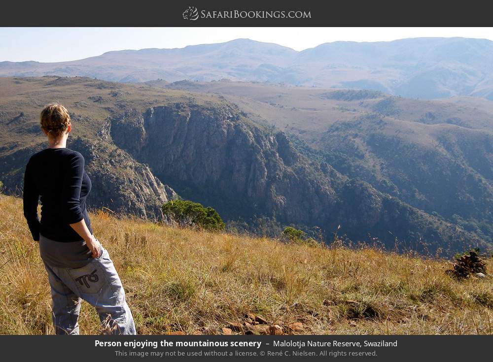 Tourist enjoying the mountainous scenery in Malolotja Nature Reserve, Swaziland