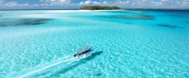 Boat approaching Mnemba Island