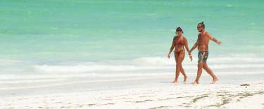 Couple walking on the beach