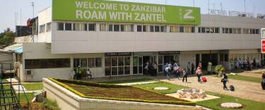 Passengers entering the airport building