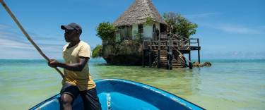 Transfer to The Rock Restaurant by boat
