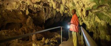 Guide leading the way in Kiwengwa Caves