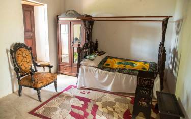 Restored bedroom in Bi Khole Palace Museum