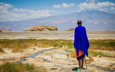 Maasai at the lakeshore in front of Ol Doinyo Lengai