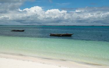Fishing boats anchored by the beach