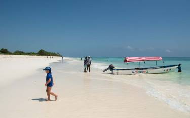 Activities boat lying at the beach