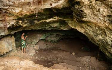 Thumbnail of Visitor exploring Twin Caves