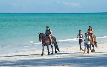 Thumbnail of Horse riding on the beach