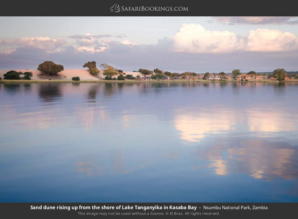 Sand dune rising up from the shore of Lake Tanganyika in Kasaba Bay in Nsumbu National Park, Zambia