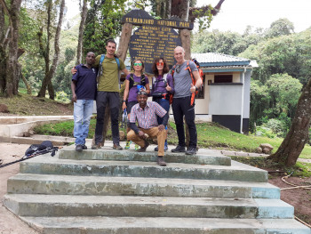 tour leaders + staff+tourists hikking the Kili