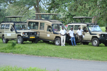 Enzi Safaris vehicles with driver guides.