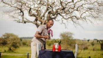 Staff setting up a sundowner.