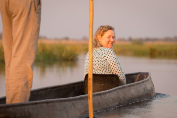 Director Michelle on a mokoro in Botswana