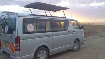 Back of Africa Adventure Manager Making Bookings.