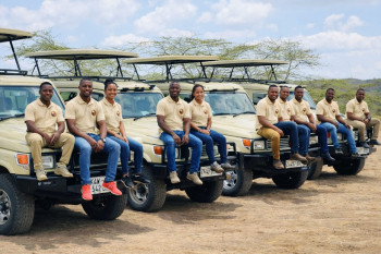 Our Professional Team seated in our Safari Jeeps.